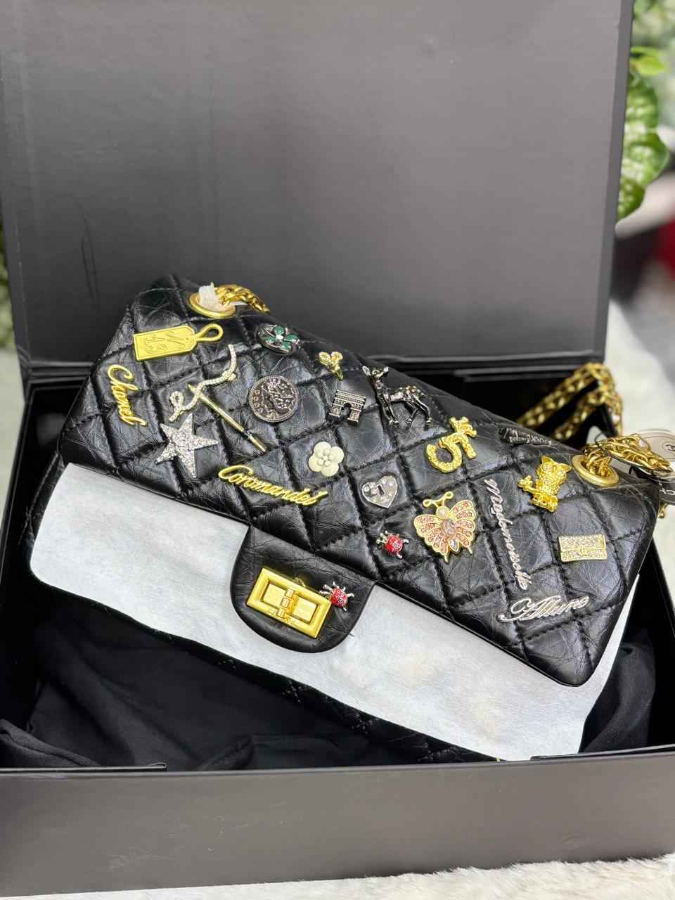 Chanel multi charms quilted bag