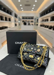 Chanel multi charms quilted bag