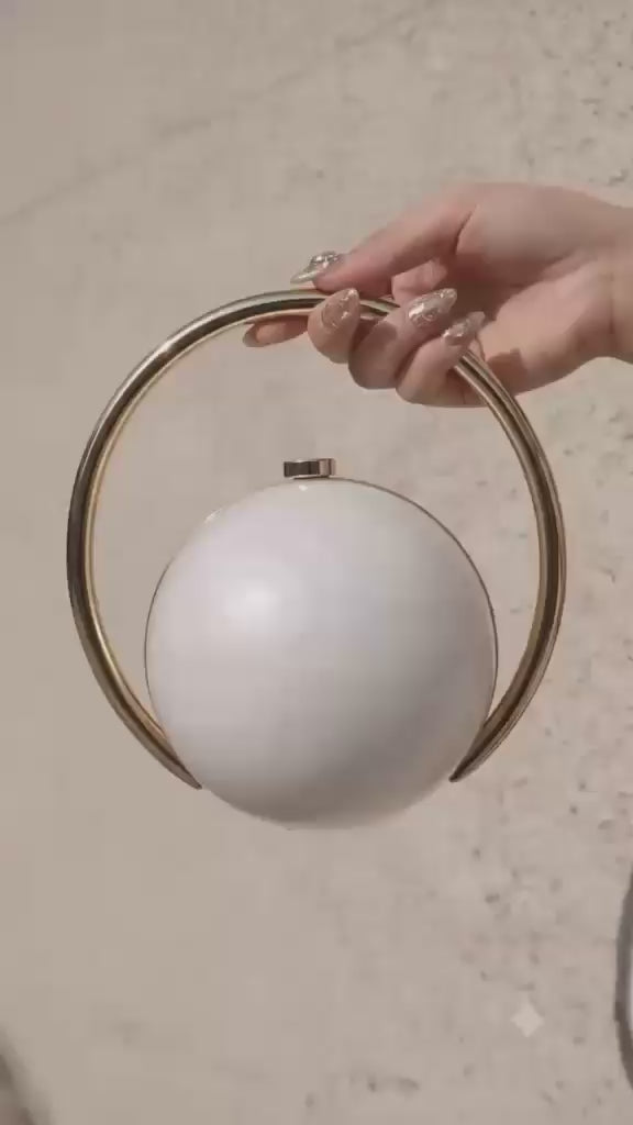 Load video: Luxury Sphere clutch